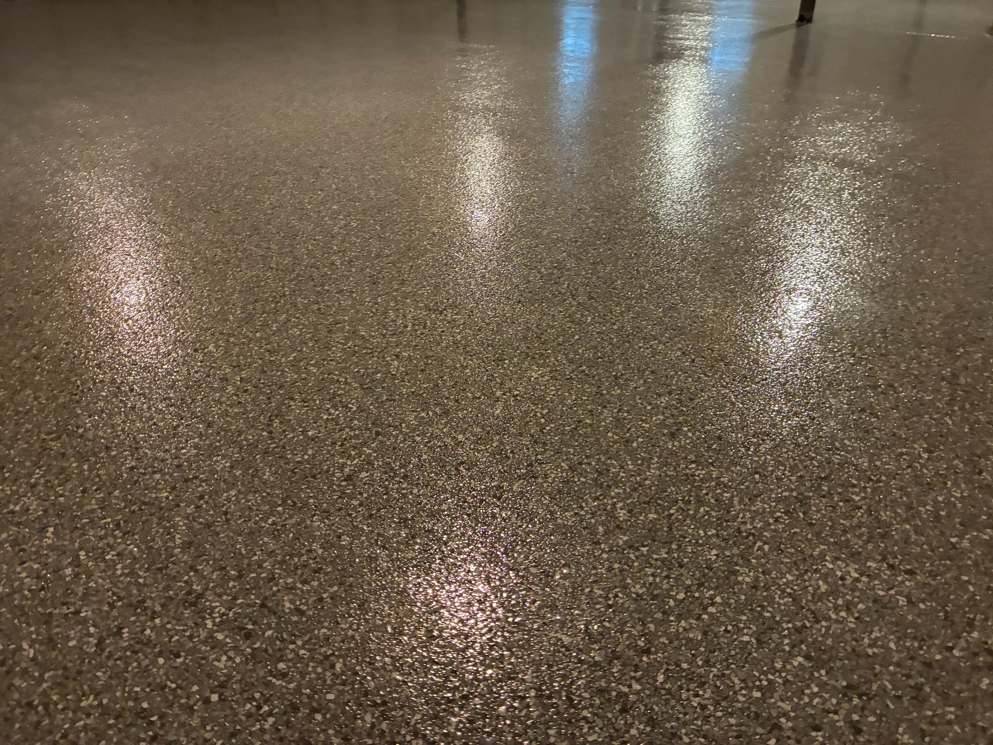 Close-up of basement epoxy flake finish