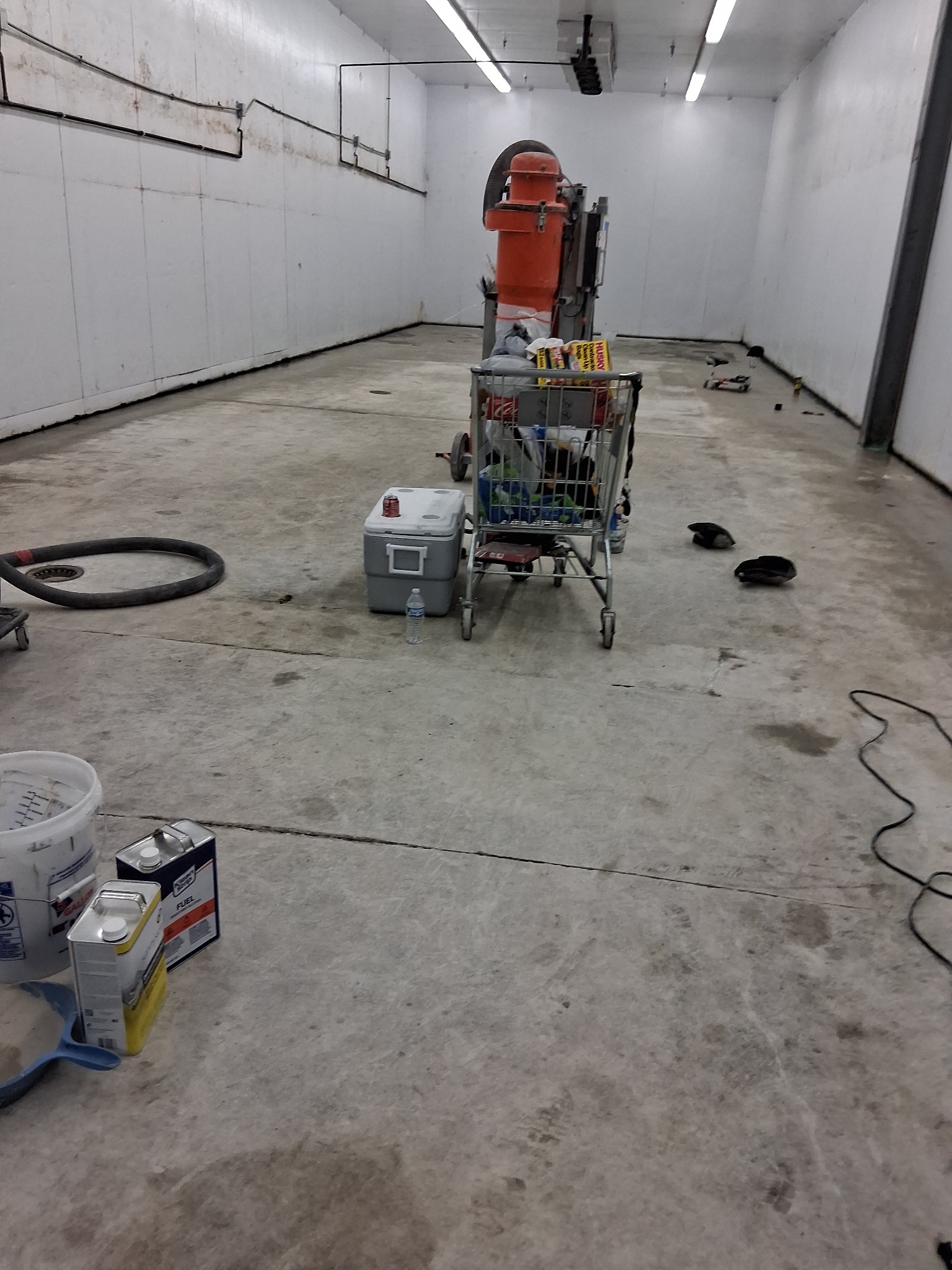 Commercial epoxy floor surface preparation by J&J Custom Flooring